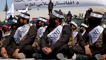عناصر أمن أفغان خلال احتفال تخرجهم في مركز تدريب الشرطة الإسلامية في منطقة جوزارا بمقاطعة هرات (28 ايلول 2023ـ أ ف  ب). 