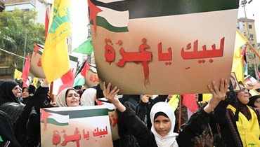  تجمّع تضامنيّ نصرة للقدس وكل فلسطين، نظّمه "حزب الله" في مجمع الإمام المجتبى في الحدت - محلة السانت تيريز (حسام شبارو)