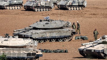 حشد عسكري إسرائيلي على الحدود مع غزّة (أ ف ب).