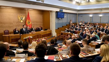 سبايتش يلقي كلمة أمام البرلمان في بودغوريتشا (31 ت1 2023، أ ف ب). 