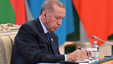 إردوغان في أوزبكستان (أ ف ب). 