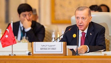 إردوغان متكلما خلال اجتماع طارئ لجامعة الدول العربية ومنظمة التعاون الإسلامي في الرياض (11 ت2 2023، أ ف ب).