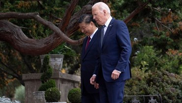 الرئيس جو بايدن ونظيره الصيني شي جينبينغ (أ ف ب). 
