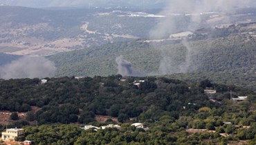 دخان يتصاعد بعد سقوط صواريخ أطلقت من لبنان (أ ف ب).