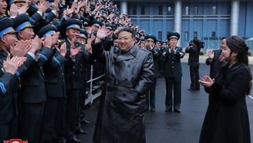 الزعيم الكوري الشمالي خلال الاحتفال بـ"عصر جديد من القوّة الفضائية" (أ ف ب).
