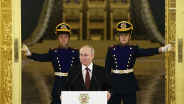بوتين خلال احتفال في الكرملين بموسكو لتسلم أوراق اعتماد سفراء أجانب معينين حديثا لدى روسيا (4 ك1 2023، أ ف ب). 