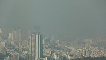 صورة ارشيفية- ضباب يغطي طهران (14 ت2 2023، أ ف ب).