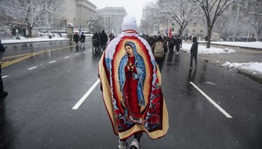 نشطاء مناهضون للإجهاض يشاركون في المسيرة السنوية من أجل الحياة، في واشنطن العاصمة (19 ك2 2024 - أ ف ب).