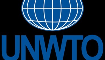 شعار منظمة السياحة العالميّة (ويكيبيديا). 