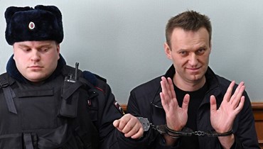 نافالني خلال جلسة استئناف في محكمة في موسكو (30 آذار 2017، أ ف ب). 