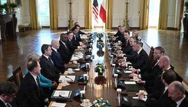 الرئيس البولندي أندريه دودا ورئيس الوزراء دونالد تاسك يلتقيان بالرئيس الأميركي جو بايدن في البيت الأبيض في واشنطن العاصمة (12 آذار 2024 - أ ف ب).