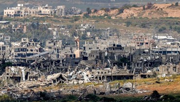صورة ملتقطة من الحدود الجنوبية لإسرائيل مع قطاع غزة، تظهر أبنية مدمرة في الأراضي الفلسطينية من جراء قصف اسرائيلي (19 آذار 2024ـ أ ف ب). 