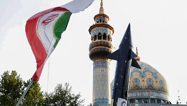 احتفالات في طهران بعد الهجوم  الصاروخي (أ ف ب)