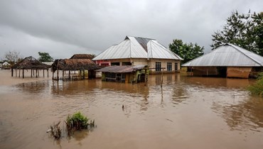 منازل غمرتها المياه في تنزانيا (أ ف ب) 