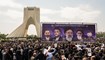 تشييع رئيسي وعبداللهيان ورفاقهما بمأتم شعبي حاشد في طهران (أ ف ب).