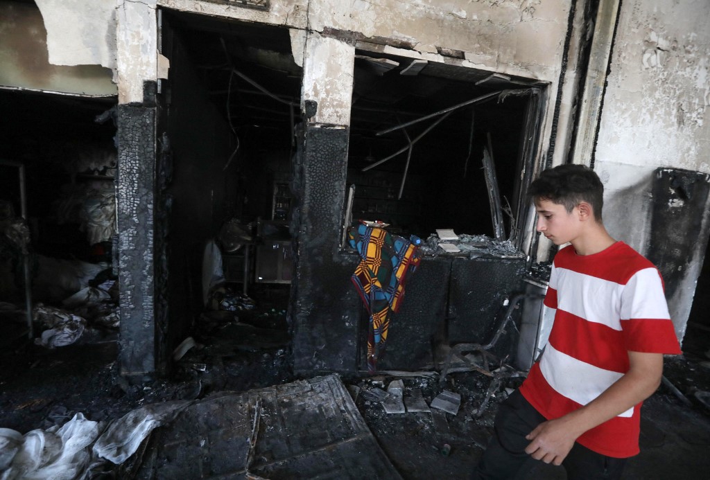 "كلّنا ميّتون"... قرقوش العراقيّة المفجوعة تودّع ضحايا الحريق الدامي بالدموع والصلوات (صور) 000_33WT7B2